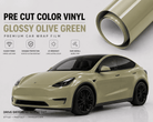 Pre-cut Tesla Vinyl Wrap Kit in glossy olive green showing a wrapped Tesla SUV and vinyl roll