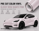 Glossy rose quartz pink Pre-cut Tesla Wrap Kit showing vinyl roll and Tesla Model Y car with premium car wrap film