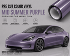 Pre-cut Tesla Wrap Kit in Mid Summer Purple glossy vinyl with durable protection on a Tesla Model 3