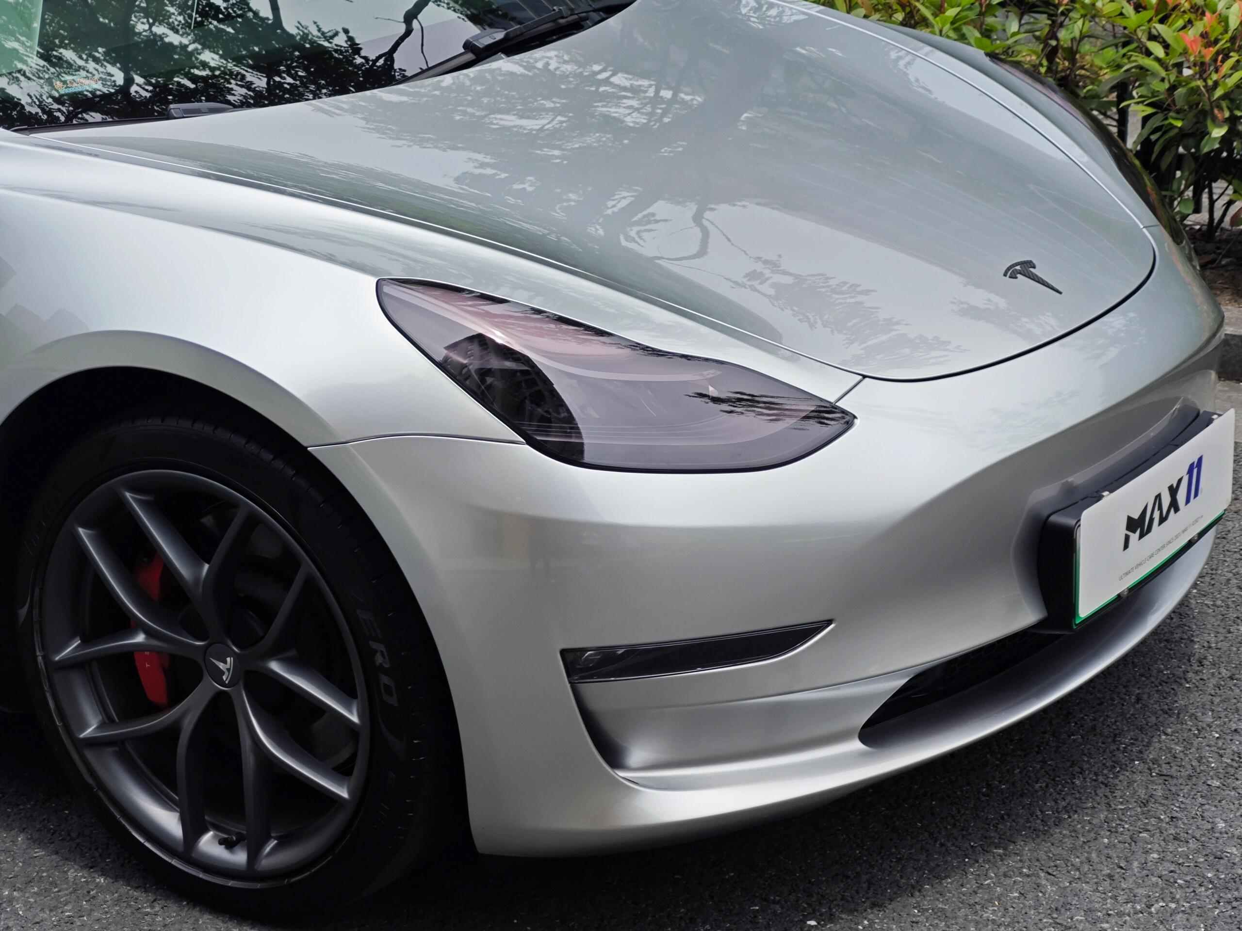 Silver Tesla Model 3 front with Pre-cut Tesla Wrap Kit applied on hood and headlights