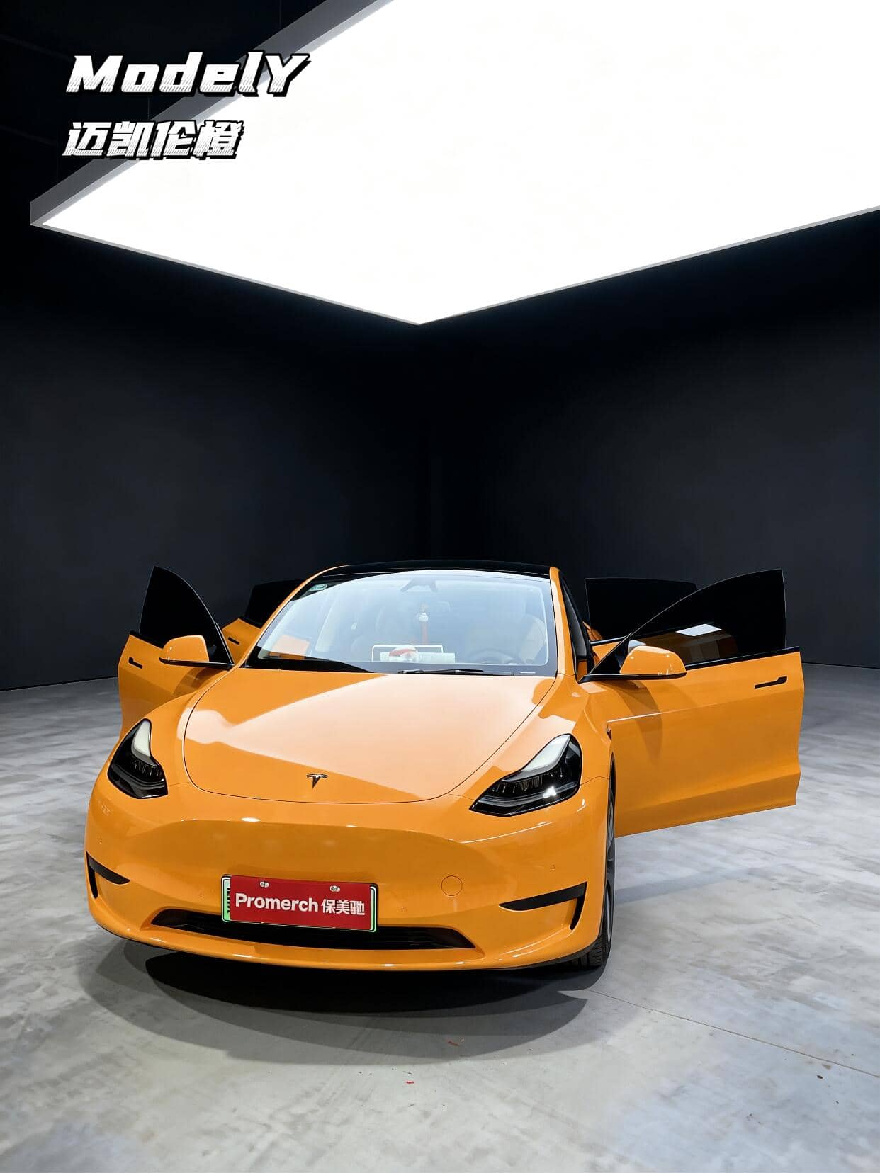 Yellow Tesla Model Y with doors open showcasing Pre-cut Tesla Wrap Kit by WrapBug