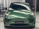 Green Tesla Model Y with shiny finish showcasing WrapBug Pre-cut Tesla Wrap Kit for vehicle customization